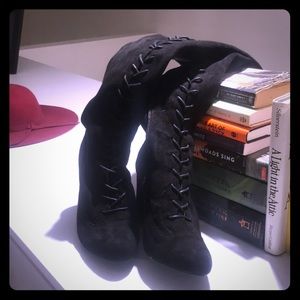 Thigh high black lace up boots